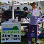 Joyce with her winning drawing and the bike bell that she won - thanks, Blue Heron Bikes! Photo courtesy Angela Armendariz