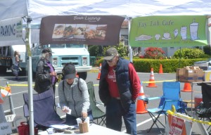 Angela & director Mac were among the many volunteers who keep the Bicycle Valet Parking flowing smoothly. Photo courtesy Francesco Papalia