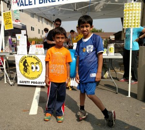 This kids loved the "Check for Bikes" pin and the boy on the right promised to share it with his younger brother